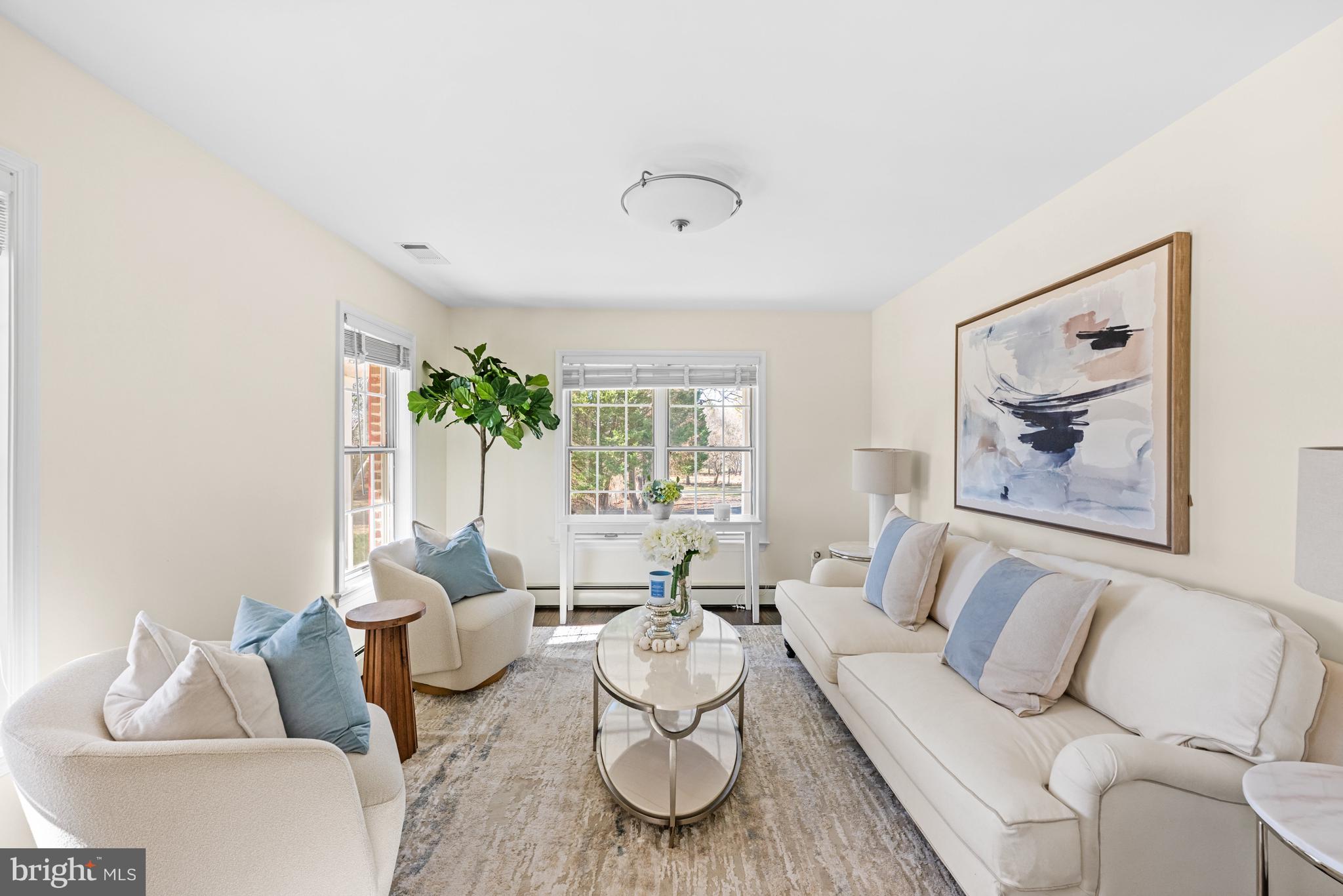 4807 Bready Road Rockville, MD 20853 - Photo 9 of 44 a living room with furniture and a large window