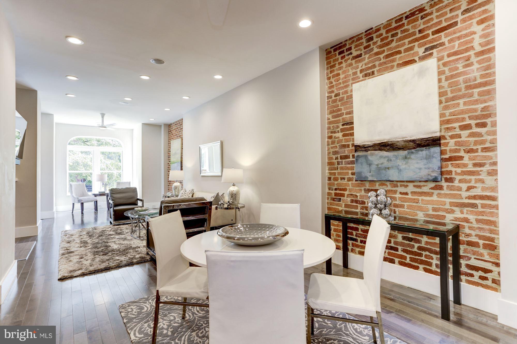 941 S Street Northwest, Unit 2 Washington, DC 20001 - Photo 3 of 12 DR WITH EXPOSED BRICK WALL