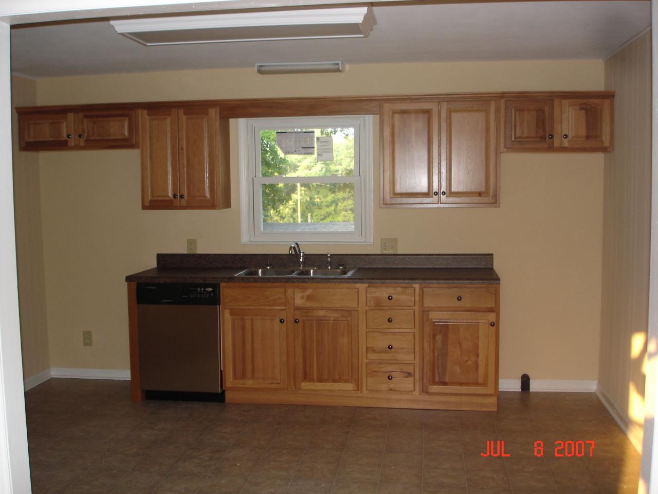 7469 Hardy Road Hardy, VA 24101 - Photo 4 of 7 a kitchen with granite countertop cabinets and window