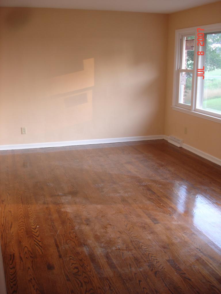 7469 Hardy Road Hardy, VA 24101 - Photo 7 of 7 an empty room with wooden floor and windows