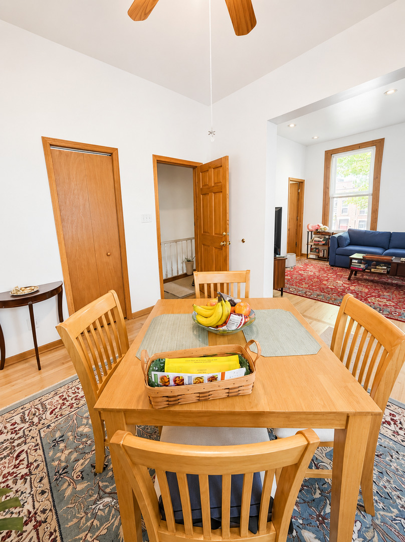 921 South Bishop Street, Unit 2 Chicago, IL 60607 - Photo 6 of 14 a living room with furniture and a wooden floor