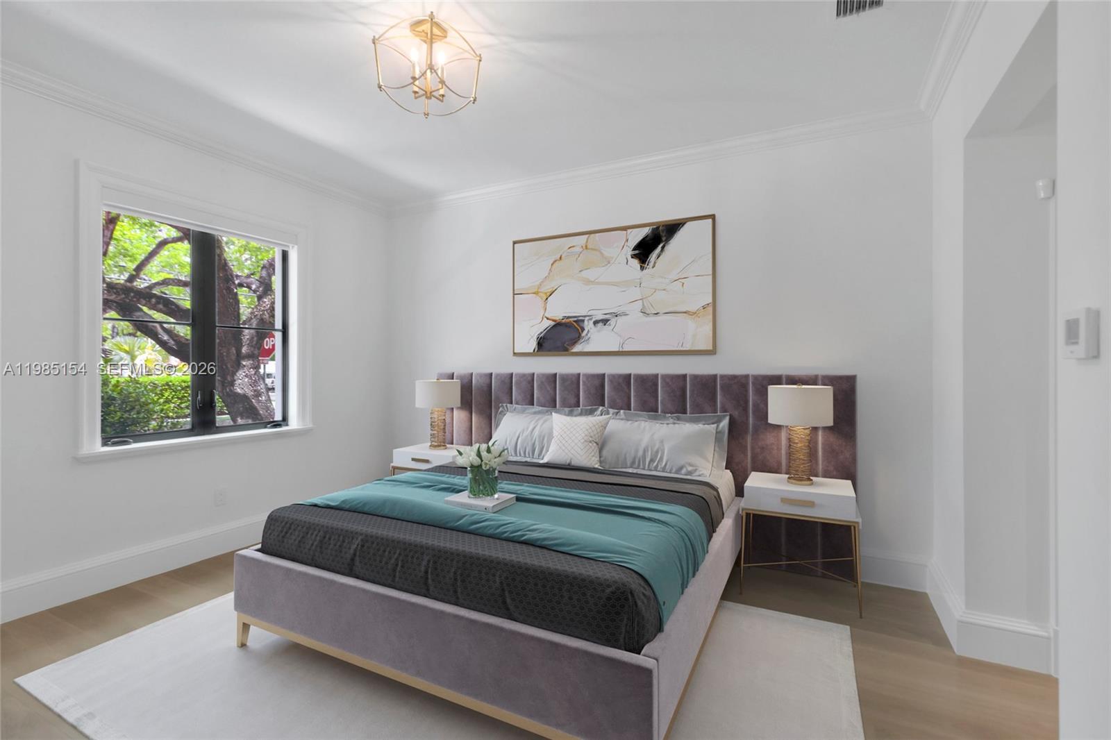 2613 Anderson Road, Unit 2613 Coral Gables, FL 33134 - Photo 12 of 96 a bedroom with a bed and a window