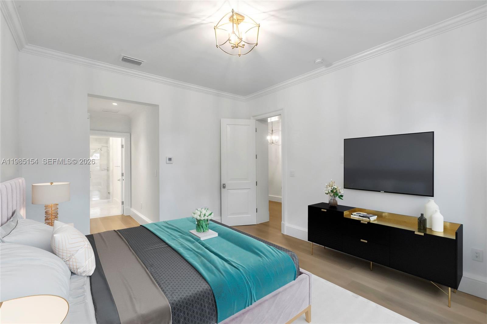 2613 Anderson Road, Unit 2613 Coral Gables, FL 33134 - Photo 14 of 96 a bedroom with bed and a flat screen tv