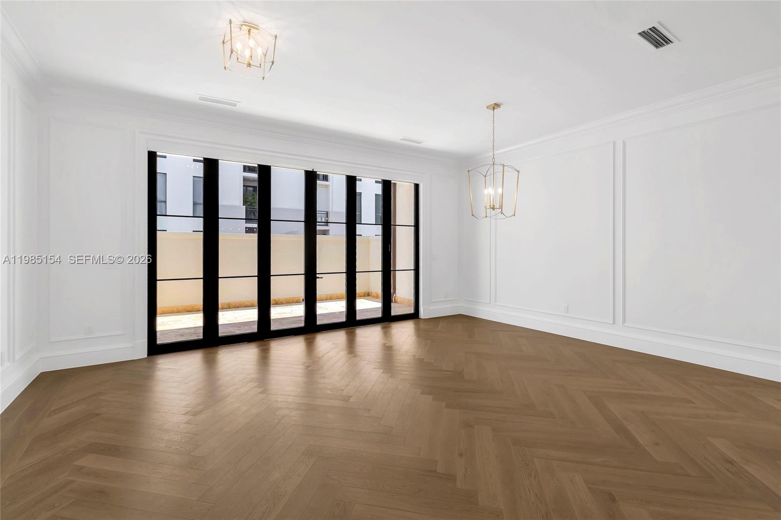 2613 Anderson Road, Unit 2613 Coral Gables, FL 33134 - Photo 38 of 96 a view of an empty room with a window