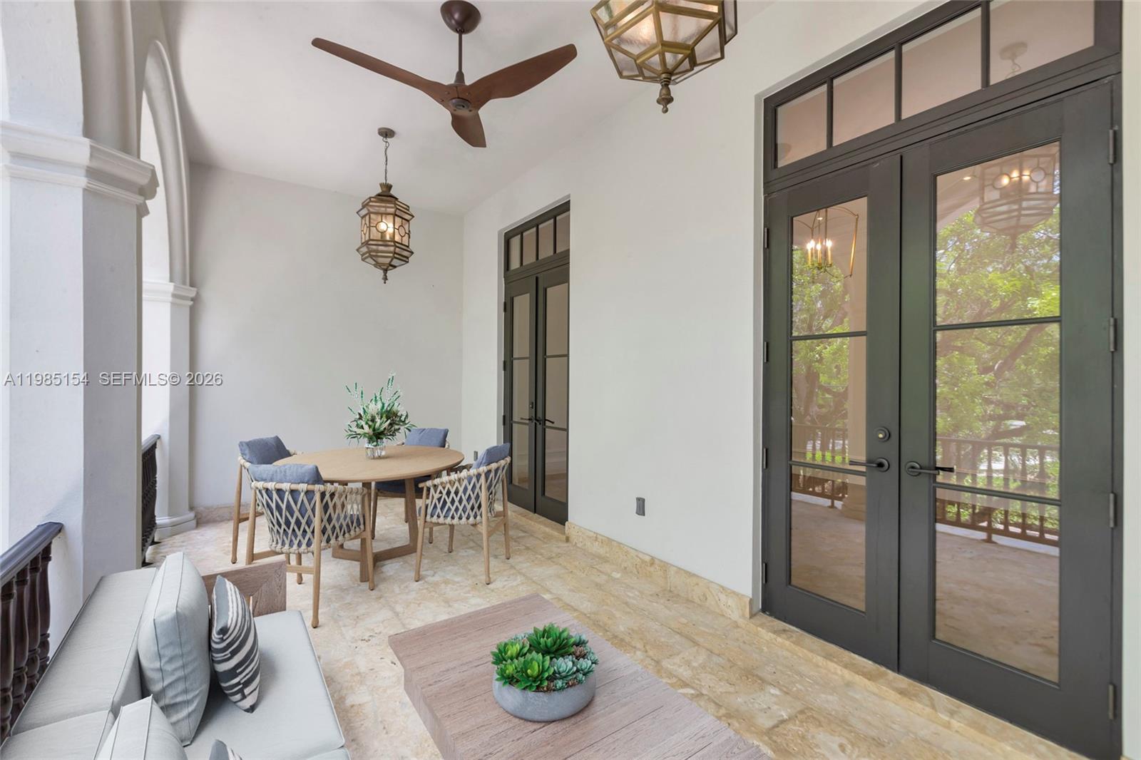2613 Anderson Road, Unit 2613 Coral Gables, FL 33134 - Photo 54 of 96 a view of a dining room with furniture window and outside view