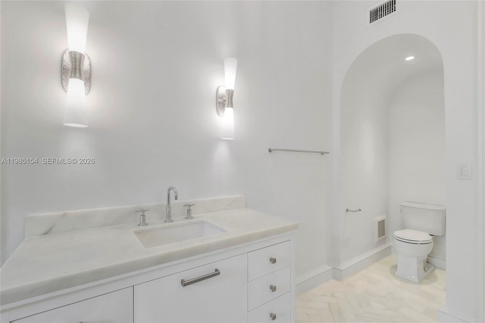 2613 Anderson Road, Unit 2613 Coral Gables, FL 33134 - Photo 70 of 96 a bathroom with a sink a toilet and shower