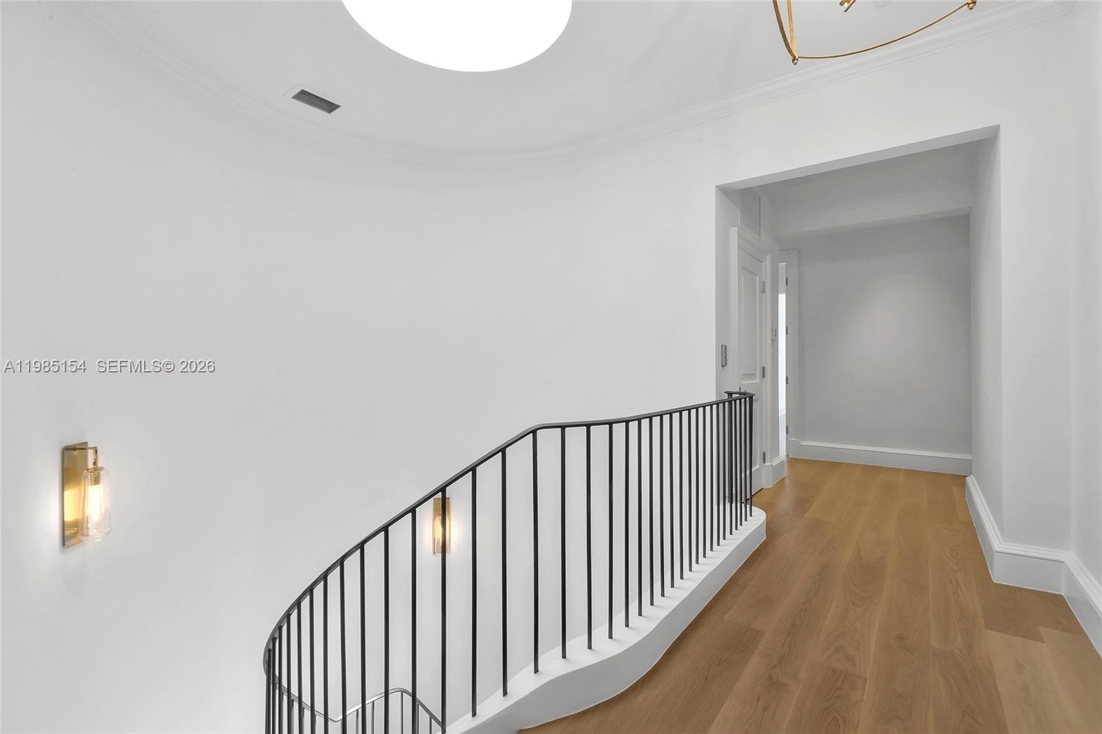 2613 Anderson Road, Unit 2613 Coral Gables, FL 33134 - Photo 75 of 96 a view of a hallway with wooden floor