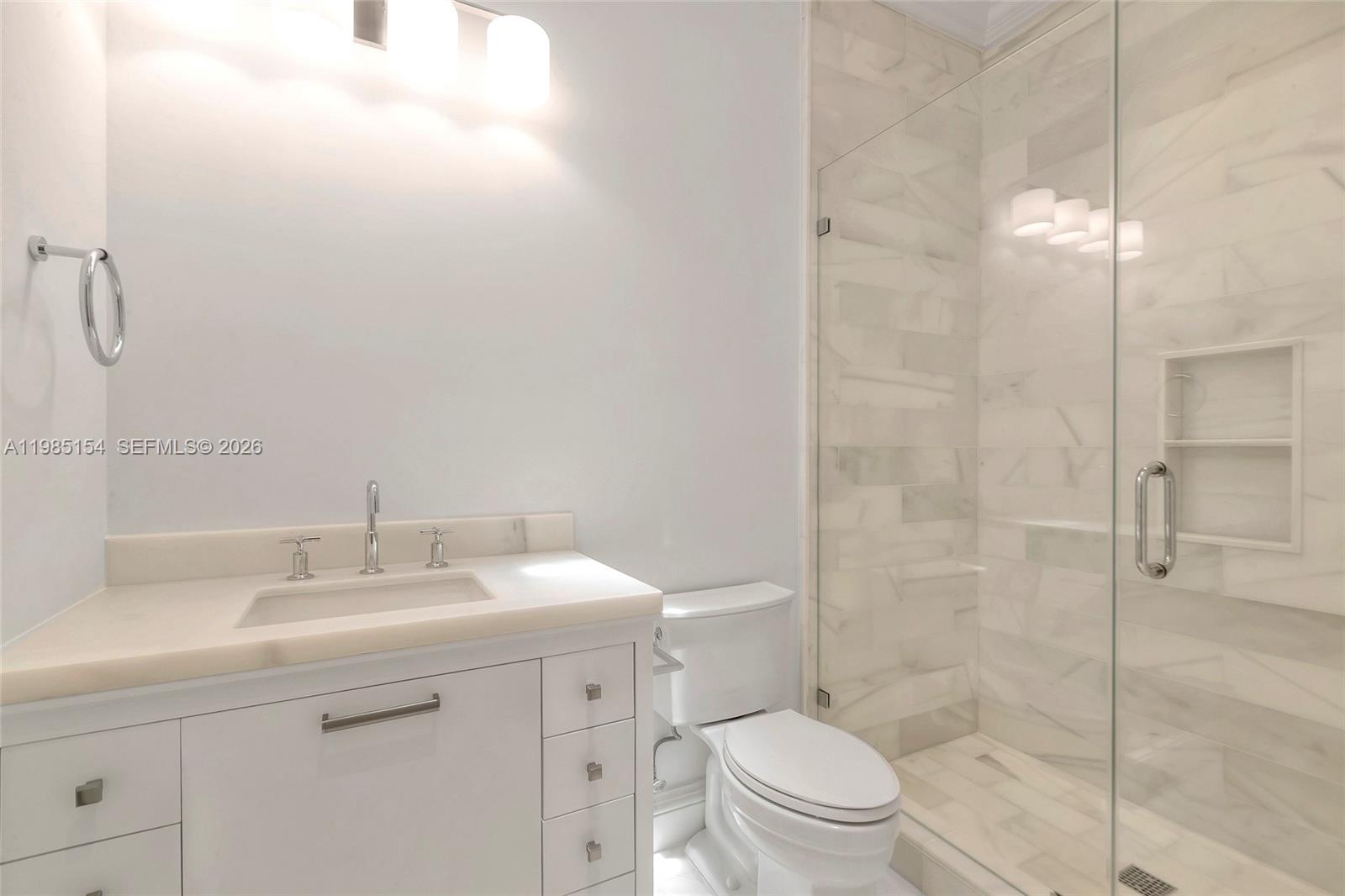 2613 Anderson Road, Unit 2613 Coral Gables, FL 33134 - Photo 85 of 96 a bathroom with a sink toilet and shower