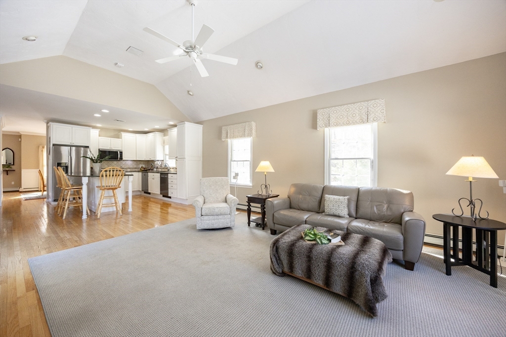48 Laurel Drive Hudson, MA 01749 - Photo 16 of 42 a living room with furniture and wooden floor
