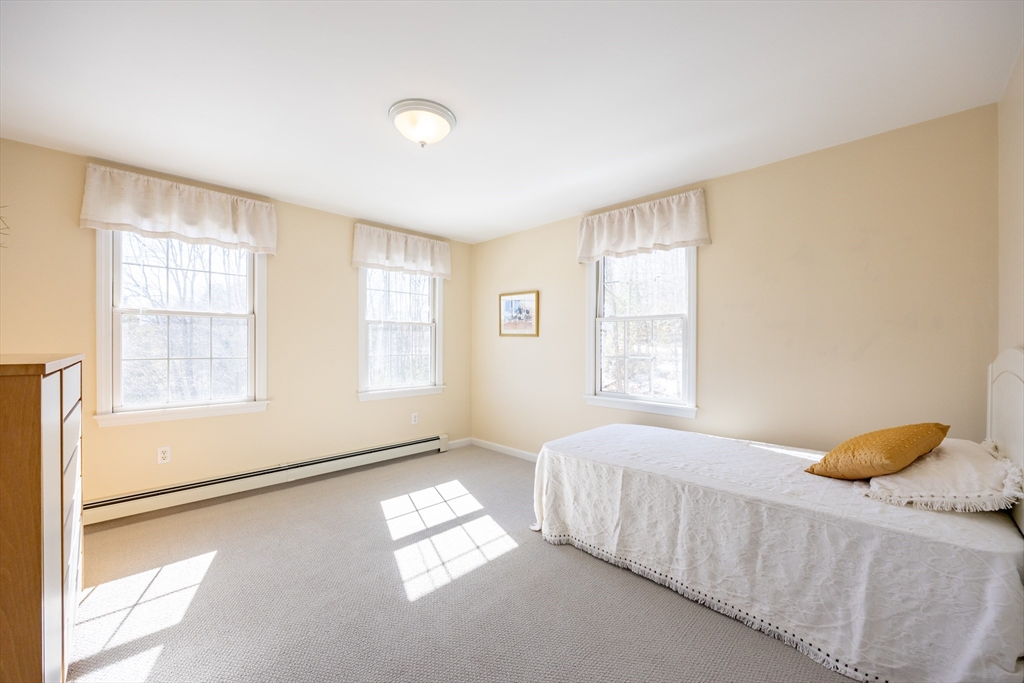 48 Laurel Drive Hudson, MA 01749 - Photo 21 of 42 a bedroom with a bed and a window