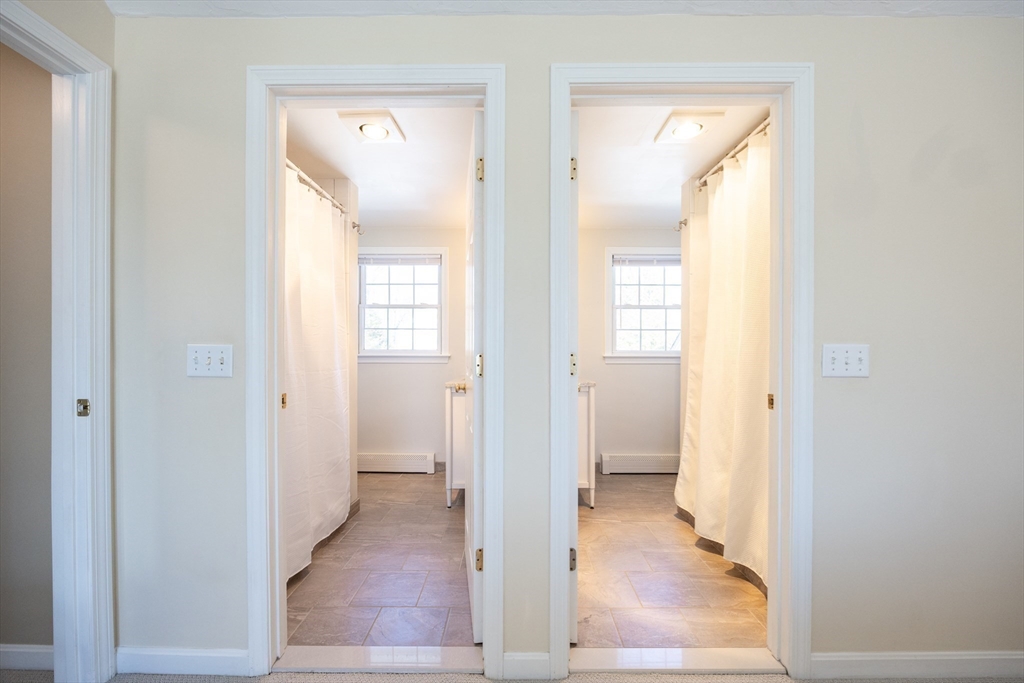 48 Laurel Drive Hudson, MA 01749 - Photo 26 of 42 a view of a bathroom from a hallway
