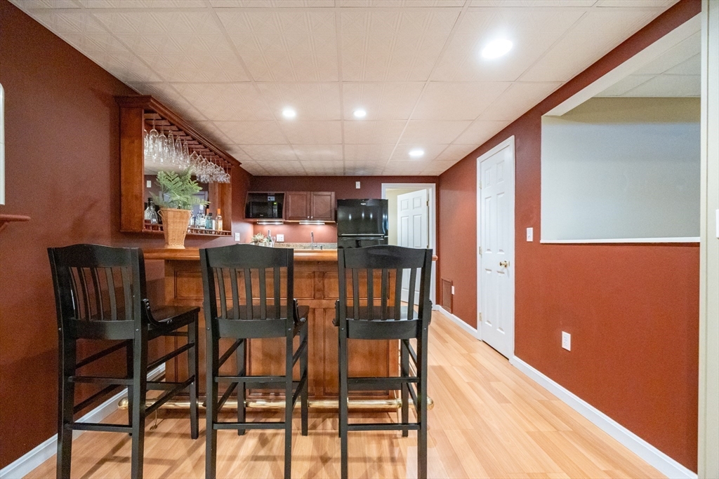 48 Laurel Drive Hudson, MA 01749 - Photo 30 of 42 a view of a dining room with furniture