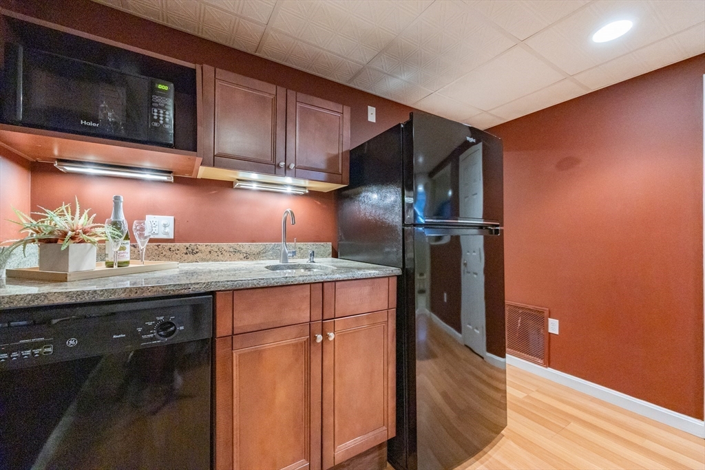 48 Laurel Drive Hudson, MA 01749 - Photo 31 of 42 a kitchen with a sink and cabinets
