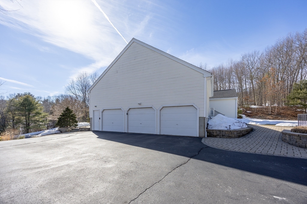 48 Laurel Drive Hudson, MA 01749 - Photo 37 of 42 a view of a house with backyard