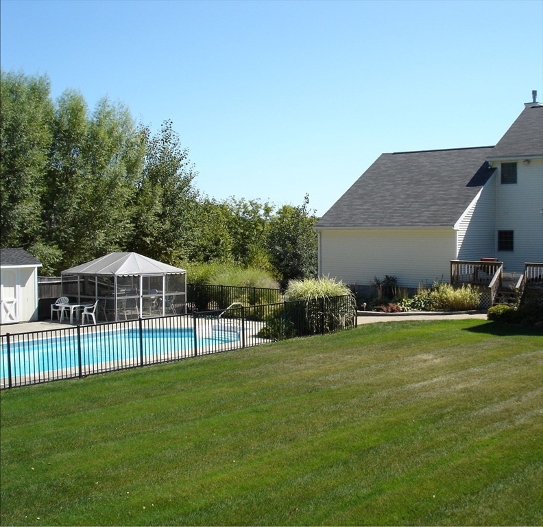 48 Laurel Drive Hudson, MA 01749 - Photo 39 of 42 a view of a house with backyard and sitting area
