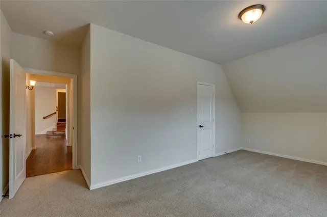 an empty room with a bathroom