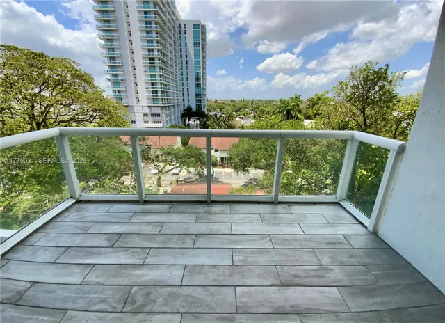 a view of a balcony with city view