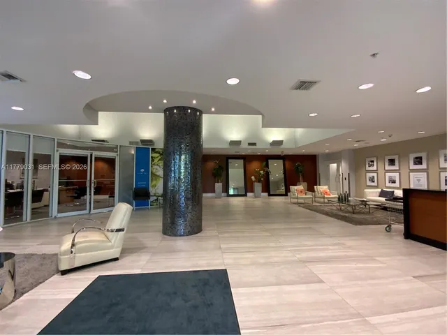 a view of a lobby with furniture
