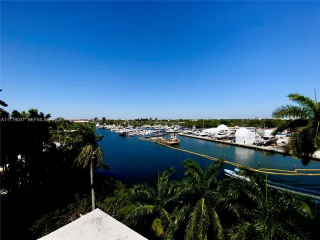 a view of a lake with a city