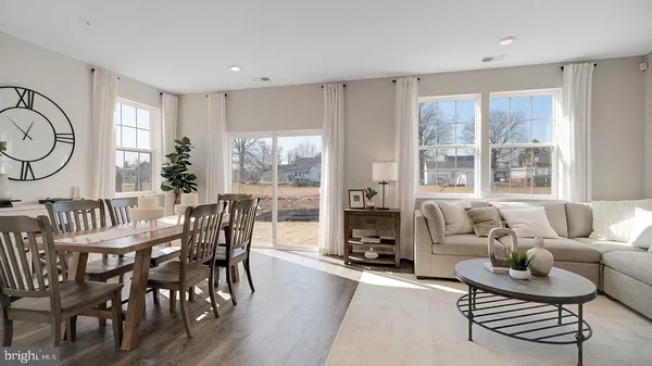 a view of a livingroom with furniture and window