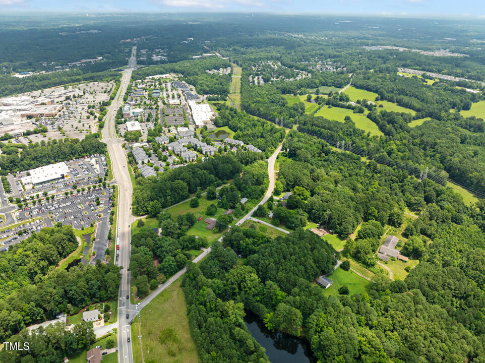 7516 Massey Chapel Road Durham, NC 27713 - Photo 11 of 12 an aerial view of residential houses with outdoor space and river