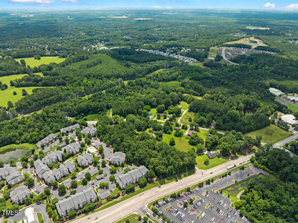7516 Massey Chapel Road Durham, NC 27713 - Photo 12 of 12 a view of a garden with an outdoor space