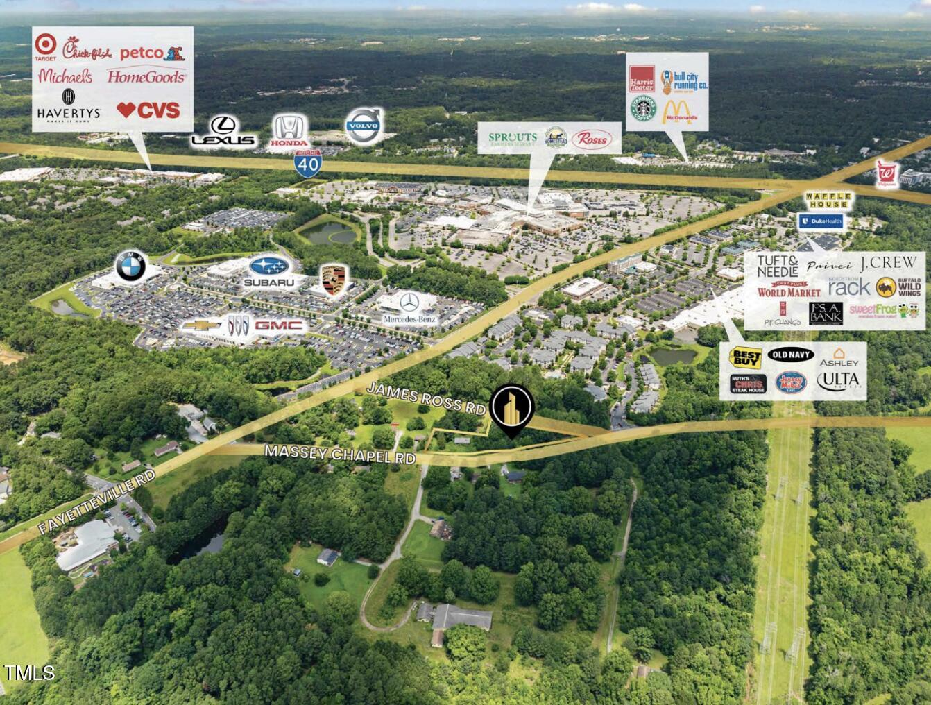 7516 Massey Chapel Road Durham, NC 27713 - Photo 7 of 12 a view of a lake with a building in the background