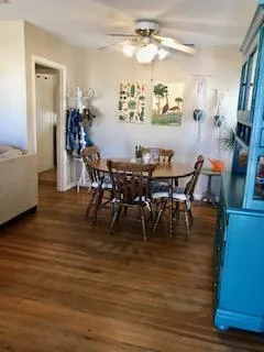 a kitchen with a sink a stove and cabinets