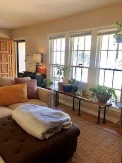 a bathroom with a sink toilet and mirror