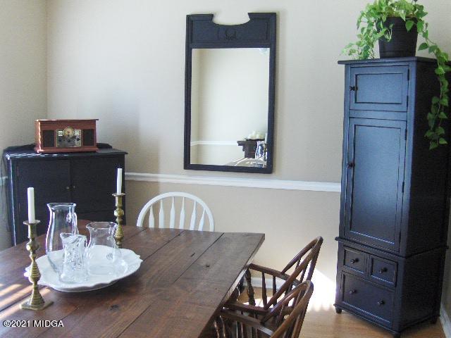 5771 Wakefield Way Macon, GA 31210 - Photo 11 of 34 a living room with furniture and wooden floor