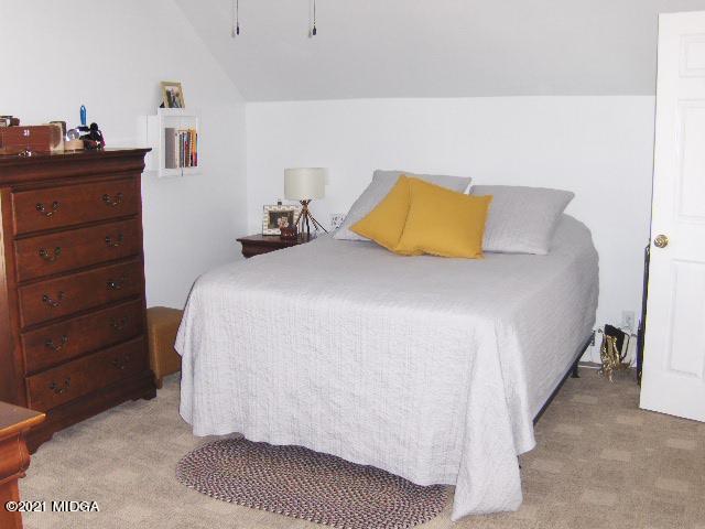 5771 Wakefield Way Macon, GA 31210 - Photo 18 of 34 a bedroom with a bed and a dresser