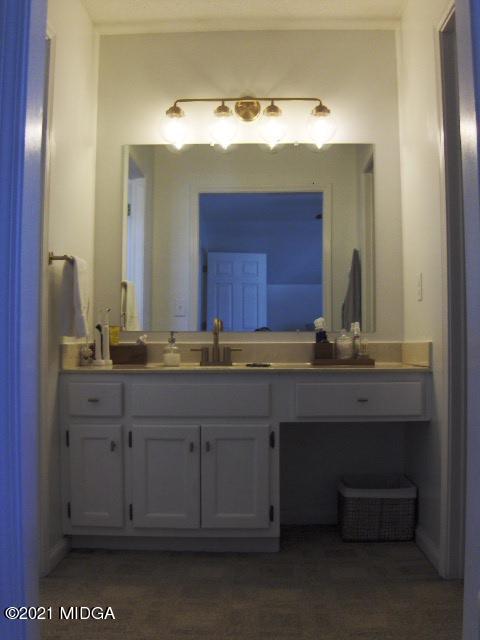 5771 Wakefield Way Macon, GA 31210 - Photo 21 of 34 a bathroom with a sink and a mirror