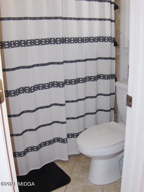 5771 Wakefield Way Macon, GA 31210 - Photo 22 of 34 a bathroom with a toilet and a shower