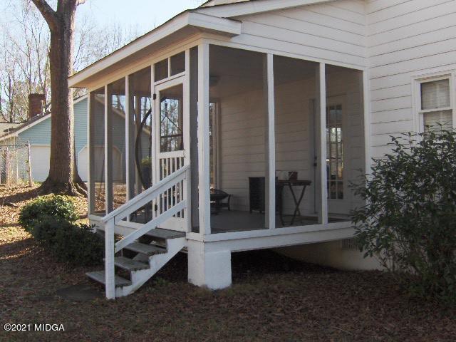 5771 Wakefield Way Macon, GA 31210 - Photo 26 of 34 a view of outdoor space with deck and yard