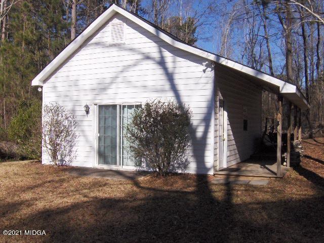 5771 Wakefield Way Macon, GA 31210 - Photo 27 of 34 a view of a house with a yard