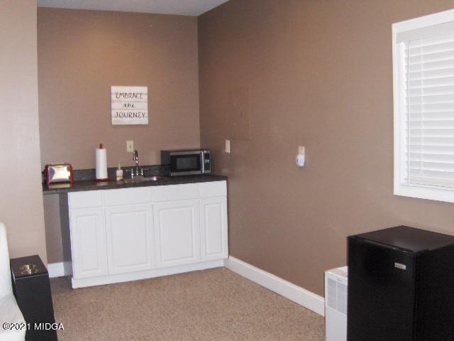 5771 Wakefield Way Macon, GA 31210 - Photo 30 of 34 a kitchen with a sink and cabinets