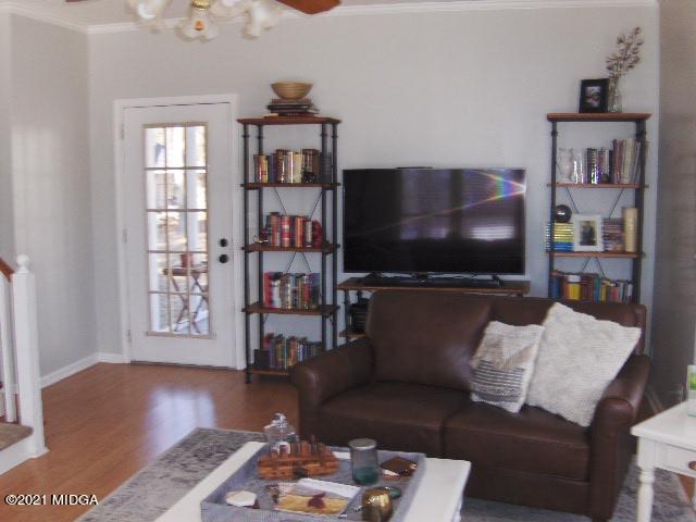 5771 Wakefield Way Macon, GA 31210 - Photo 4 of 34 a living room with furniture and a flat screen tv