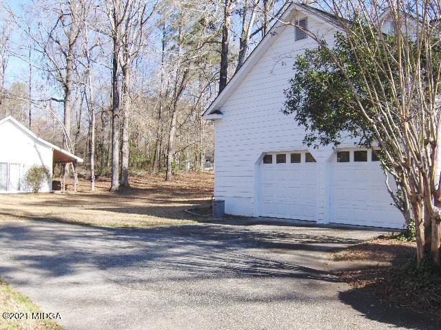 5771 Wakefield Way Macon, GA 31210 - Photo 32 of 34 a view of street along with house and trees