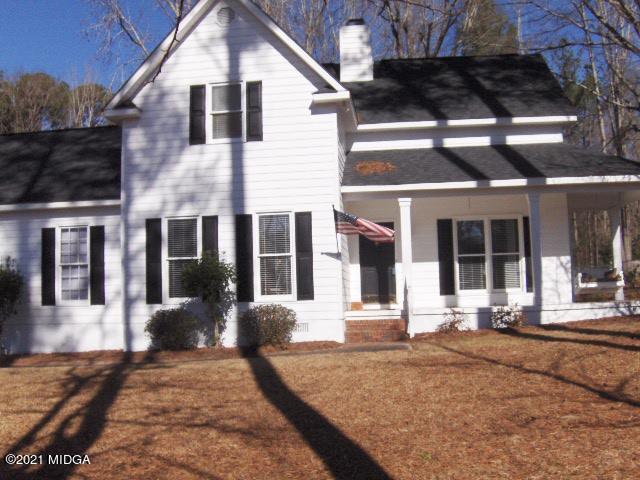 5771 Wakefield Way Macon, GA 31210 - Photo 34 of 34 a front view of a house with a yard outdoor seating and utility