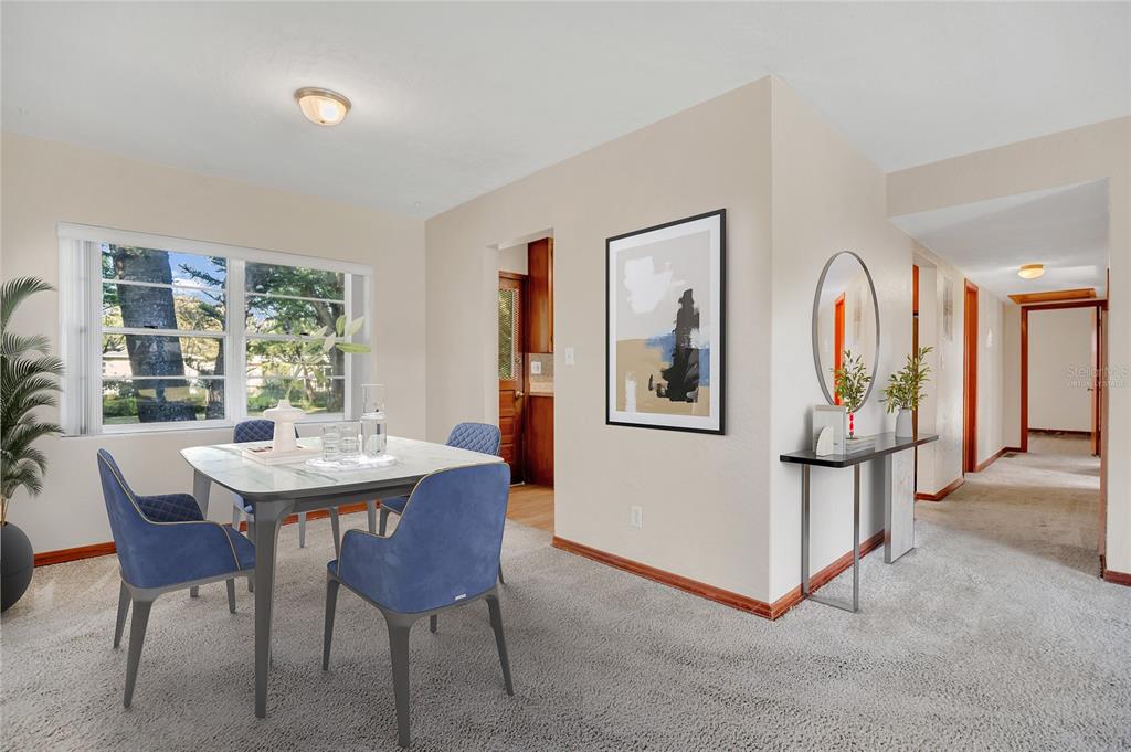2807 Nancy Street Orlando, FL 32806 - Photo 9 of 27 a view of a dining room with furniture window and outside view