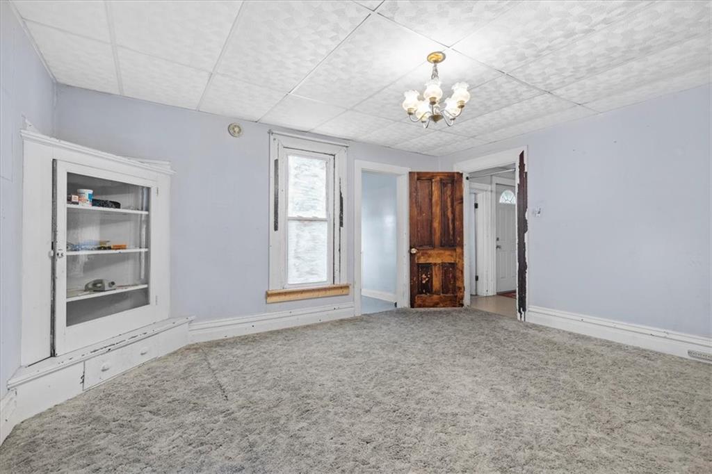 115 Meade Avenue Pittsburgh, PA 15202 - Photo 18 of 27 a view of an empty room with a window