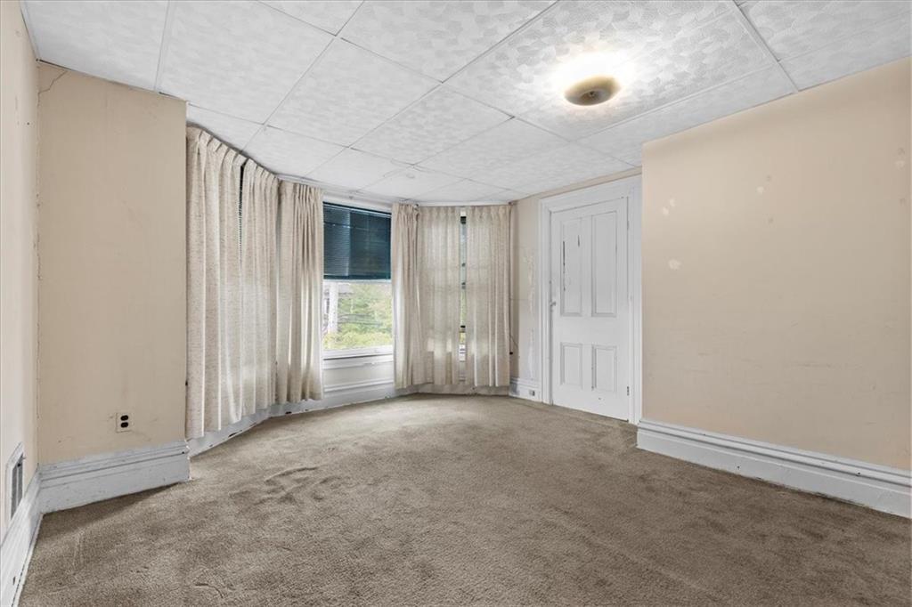 115 Meade Avenue Pittsburgh, PA 15202 - Photo 22 of 27 a view of an empty room with a window
