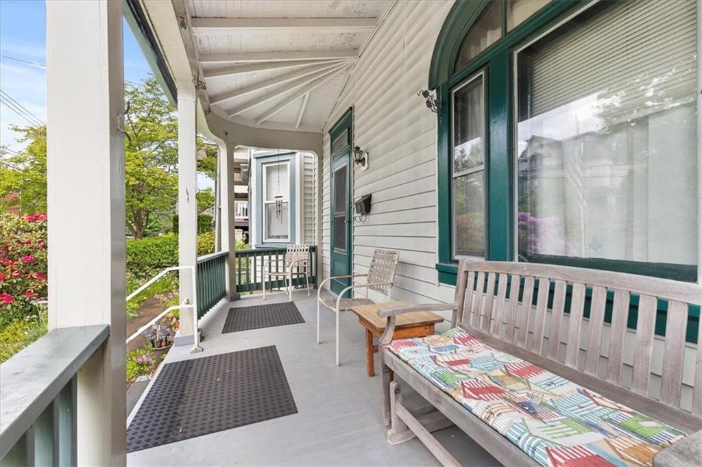 115 Meade Avenue Pittsburgh, PA 15202 - Photo 4 of 27 a balcony with furniture and a potted plant