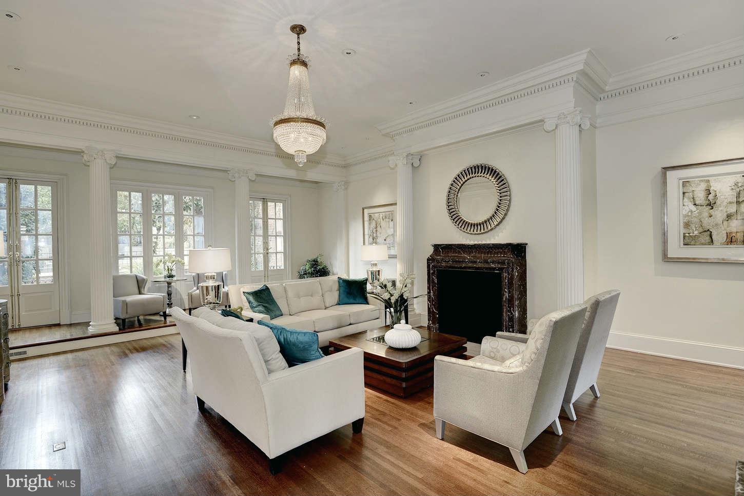 2130 Bancroft Place Northwest Washington, DC 20008 - Photo 3 of 20 a living room with furniture wooden floor and a fireplace