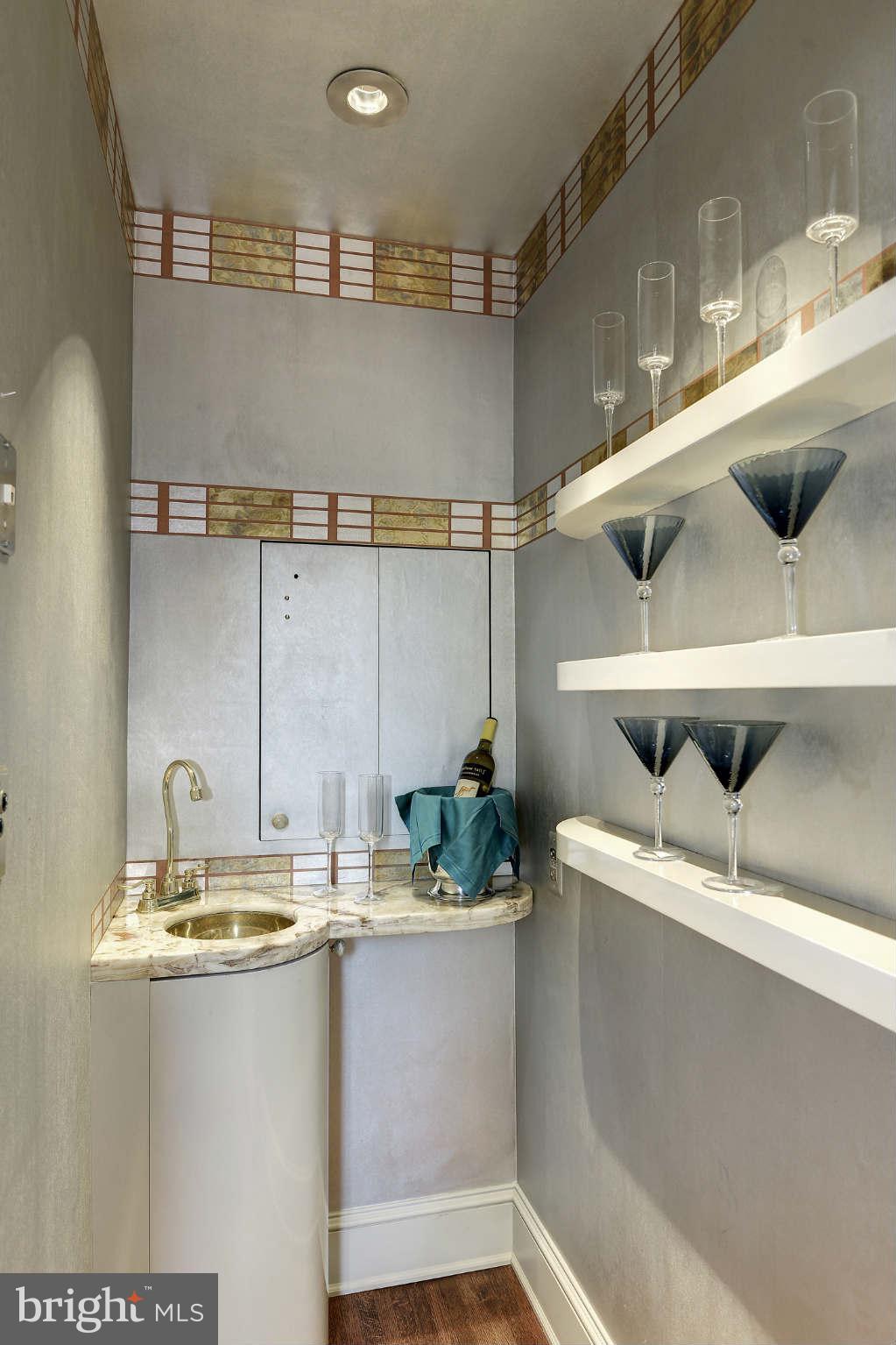 2130 Bancroft Place Northwest Washington, DC 20008 - Photo 6 of 20 a bathroom with a sink and mirror