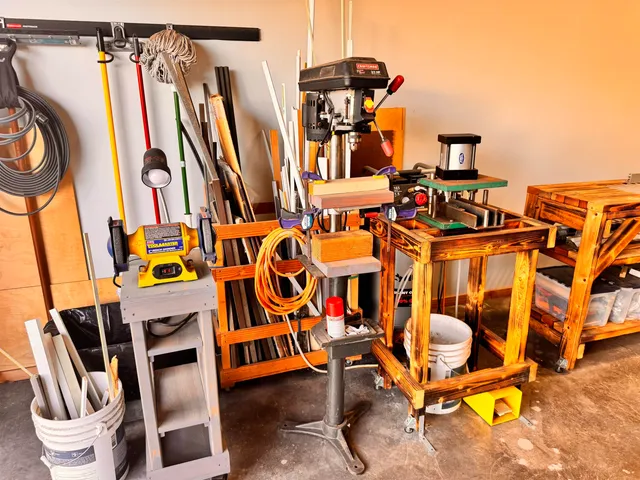 a utility room with stainless steel appliances and a refrigerator