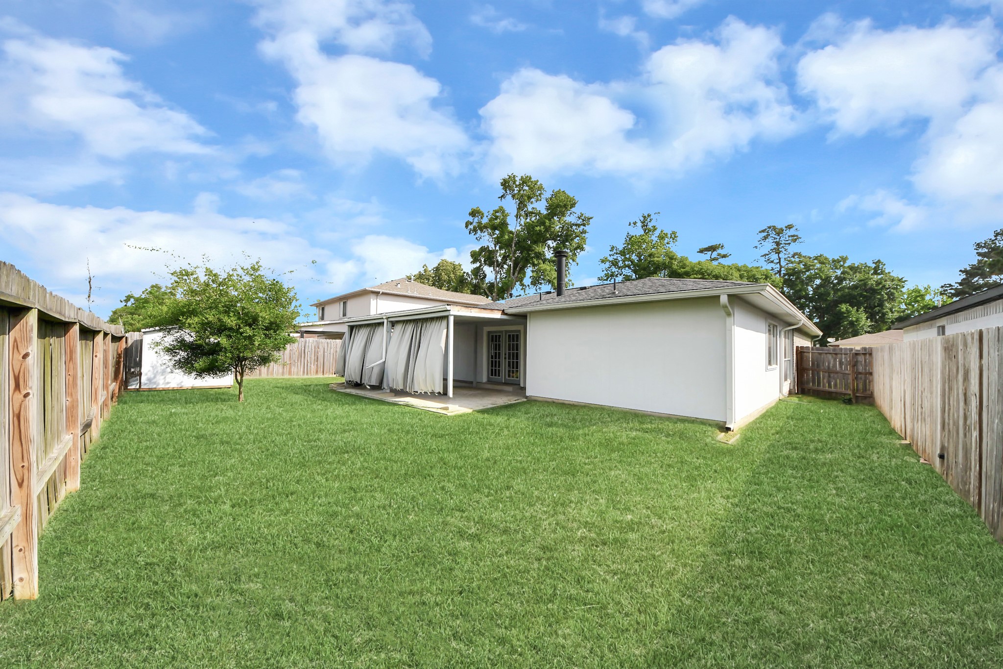 28707 Stapleford Street Spring, TX 77386 - Photo 35 of 38 a view of a house with backyard and garden