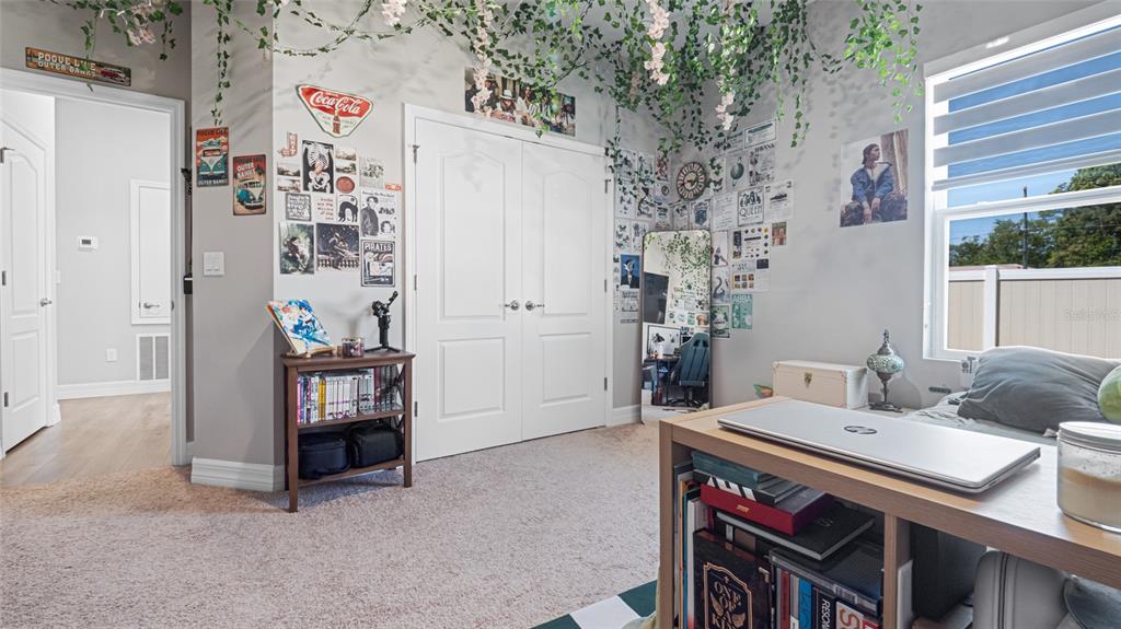 8007 Southwest 135th Loop Ocala, FL 34473 - Photo 32 of 47 a bathroom with a sink and a refrigerator