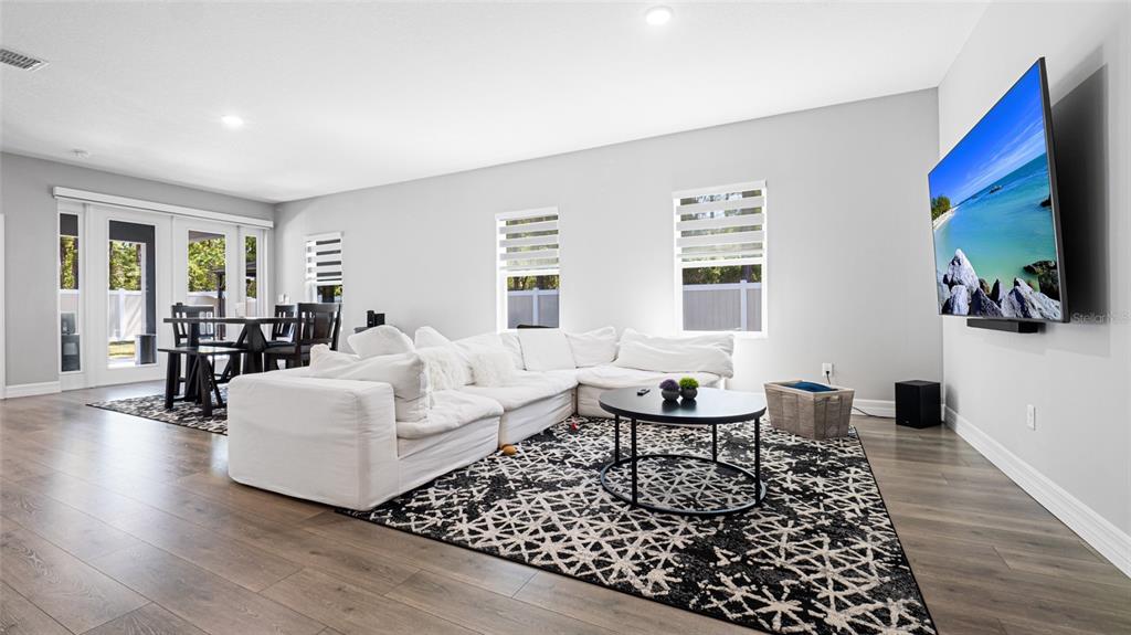 8007 Southwest 135th Loop Ocala, FL 34473 - Photo 9 of 47 a living room with furniture and a couch