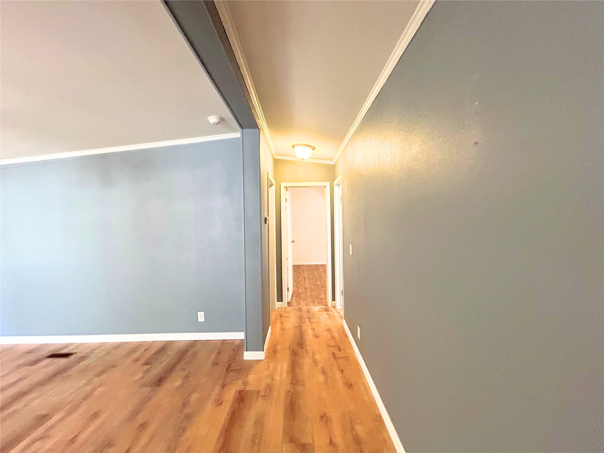 772 County Road 2191 Cleveland, TX 77327 - Photo 14 of 24 a view of a big room with wooden floor and sliding door